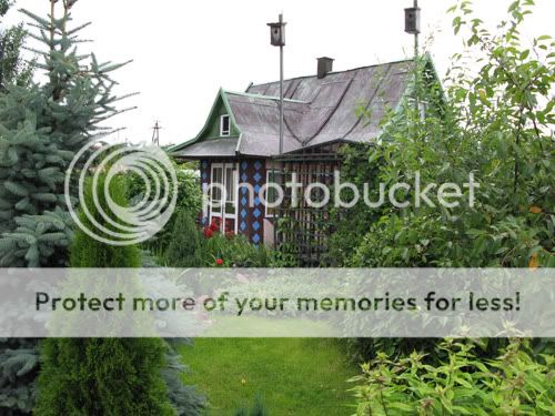 Trees, landscaping and a humble cottage are part of this family plot.
